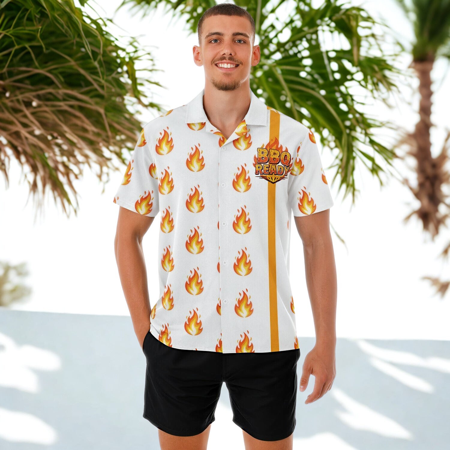 Man wearing a white shirt with flame patterns and 'BBQ Ready' text, standing outdoors with palm trees.